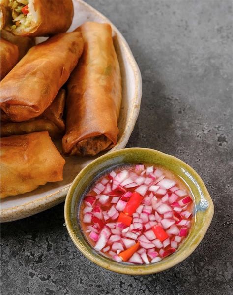 Filipino Lumpiang Gulay Or Vegetable Spring Rolls With Sweet Chili