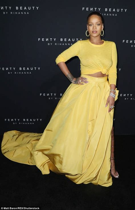 Rihanna Glows In Yellow Skirt For Fenty Beauty Launch