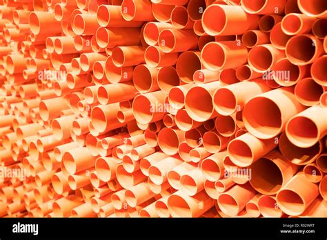 Orange Pvc Pipes Stacked In Construction Site Stock Photo Alamy
