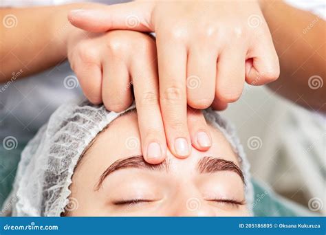 Massage Of Forehead Of Woman Stock Image Image Of Massaging Face 205186805