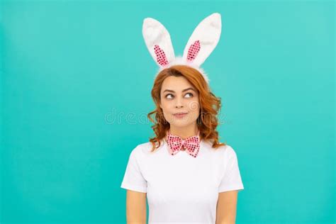 Dreamy Easter Girl In Bunny Ears And Bow Tie On Blue Background Stock