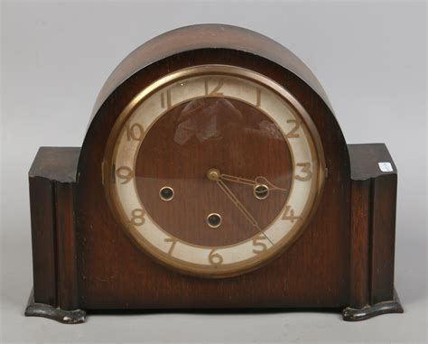 An Oak Cased Smiths Enfield Westminster Chime Mantle Clock With