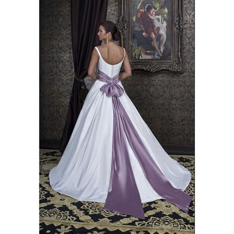 A Woman In A White And Purple Wedding Dress