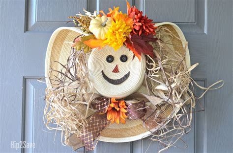 It is the cutest idea out there for a tutu halloween i ordered the coordinating scarecrow hats from chasing fireflies for $12.50 each (if. DIY Scarecrow Wreath from a Straw Hat - Hip2Save | Diy scarecrow, Scarecrow wreath, Scarecrow