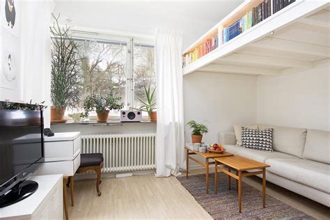 Small Swedish Studio Apartment Elegantly Combines Loft Bed