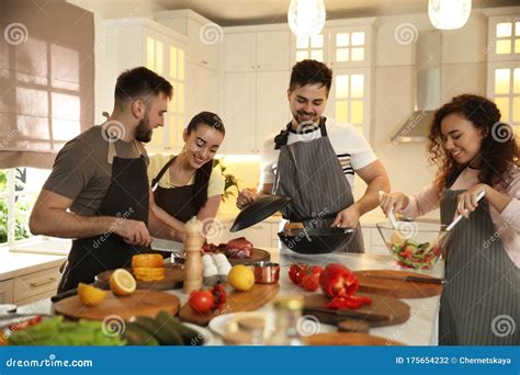 Happy People Cooking Food In Kitchen Stock Photo Image Of Healthy