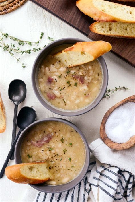 Stir in the water, ham, seasonings and whole and mashed beans; White Bean and Ham Soup - Simply Scratch