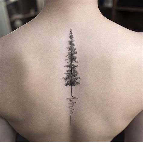 Pine Tree Tattoo On The Upper Back