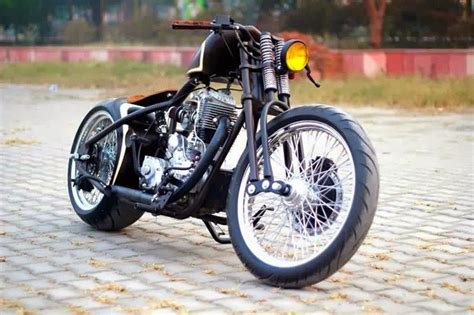 Royal Enfield With A Springer Fork Cafe Racer Motorcycle Bobber