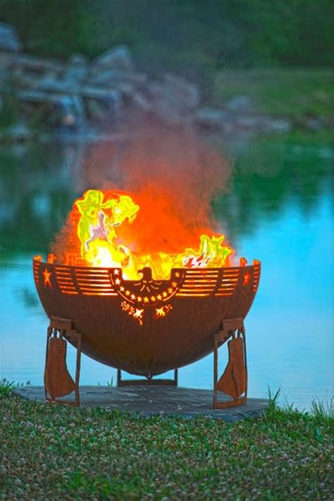 Continue adding wood to maintain the flames. Artistic Sphere Fire Pit | The Owner-Builder Network