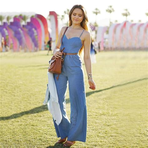 the perfect denim jumpsuit got topped off with neutral wedges a skinny belt and a midsize