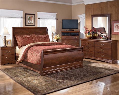 Wilmington 4 Piece Sleigh Bedroom Set In Dark Red Brown