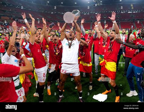 Sevillas Loic Bade Lifts The Uefa Europa League Trophy As He