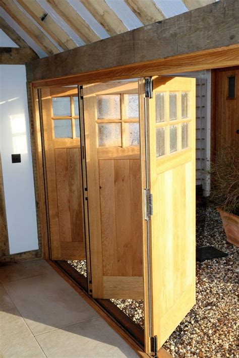 How To Design A Bifold Garage Door For Maximum Efficiency Garage Ideas