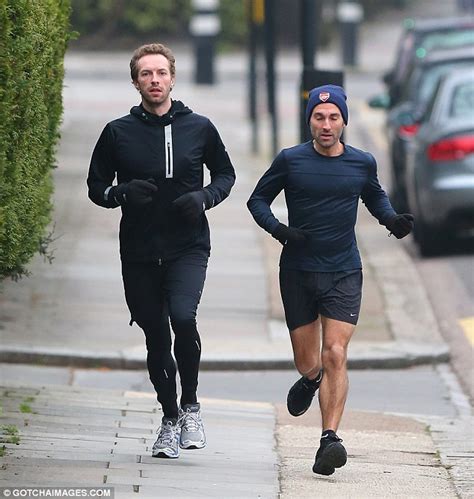 Chris Martin Covers Up In All Black Workout Gear As He Pounds The Pavements On A Gruelling Jog