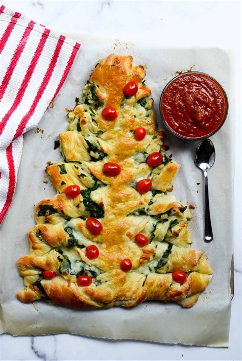 In a large bowl, stir cream cheese, artichoke hearts, spinach, parmesan, sour cream, garlic, and lemon zest and red pepper flakes (if using) until combined. Pizza Dough Spinach Dip Christmas Tree Recipe - Christmas ...