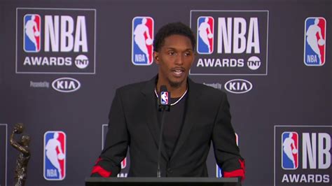 There is a tattoo made from a line which resembles two teeth with a gap between them on. Lou Williams 17'-18' NBA 6th Man Of The Year #NBAAwards ...
