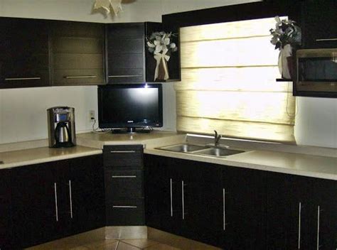 La decoración al estilo minimalista simboliza una solución estética y practica a las cocinas con dimensiones pequeñas. Fotos De Cocina Integral Minimalista Chocolate Con ...