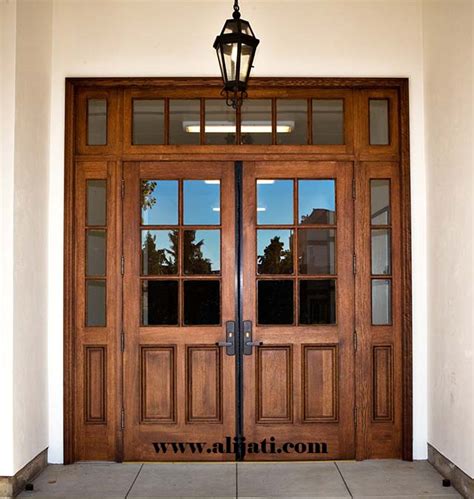 Pintu minimalis dengan kaca pantul adalah model pintu yang sangat cocok untuk pintu bagian luar rumah. pintu minimalis model eropa kayu jati
