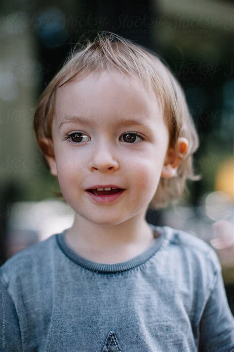 Headshot Portrait Of Smiling Little Boy By Stocksy Contributor