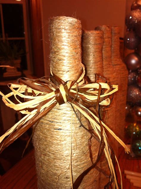 Twine Wrapped Wine Bottles With Raffia Bows Wrapped Wine Bottles