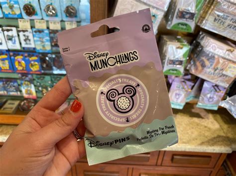 New Disney Munchlings Mystery Pin Sets Arrive At Disney Springs Mickeyblog