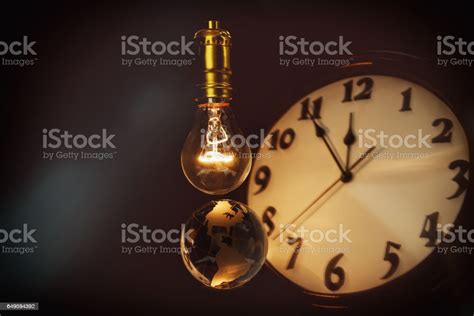 Light Bulb Earth And Clock Stock Photo Download Image Now Alarm