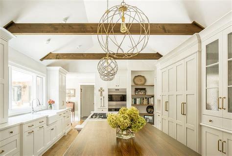 Our beams are crafted from molds made of real timber, so they look perfectly genuine. Farmhouse Kitchen with Beam Ceilings | Transitional ...