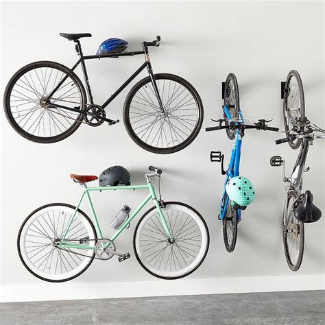 You'll never shy away from storing your bike in your apartment again! Bike Hanger | Bike hanger, Bike hanger wall, Bike wall storage