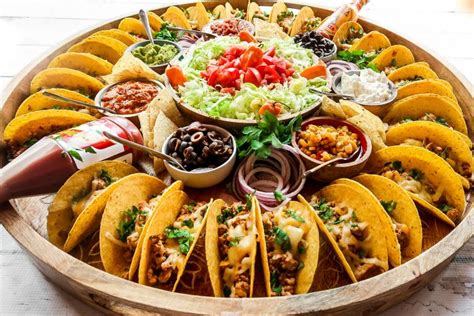 Squeeze the juice of 1 lime on the shrimp, set aside. Easy Taco Recipe Dinner Board - Reluctant Entertainer