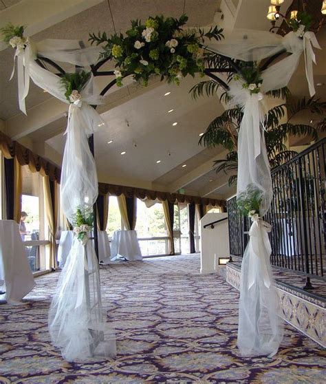 How to decorate a fishing net with starfish and shells. indoor wedding arch decorations | Tulle Covered Wedding Arches | Wedding Disk | Tulle wedding ...
