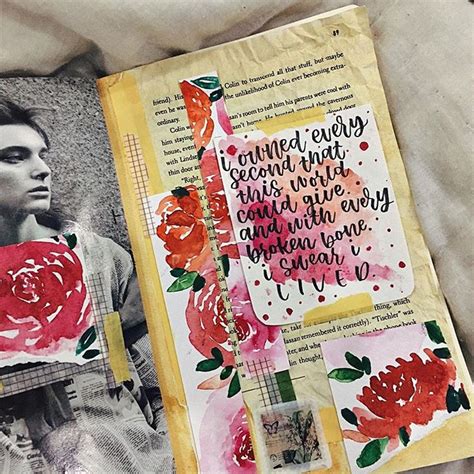 An Open Book With Flowers On It And A Page From The Book That Has Been