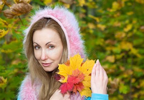 Beautiful Woman In Autumn Park With Maple Leaves Stock Photo Image Of