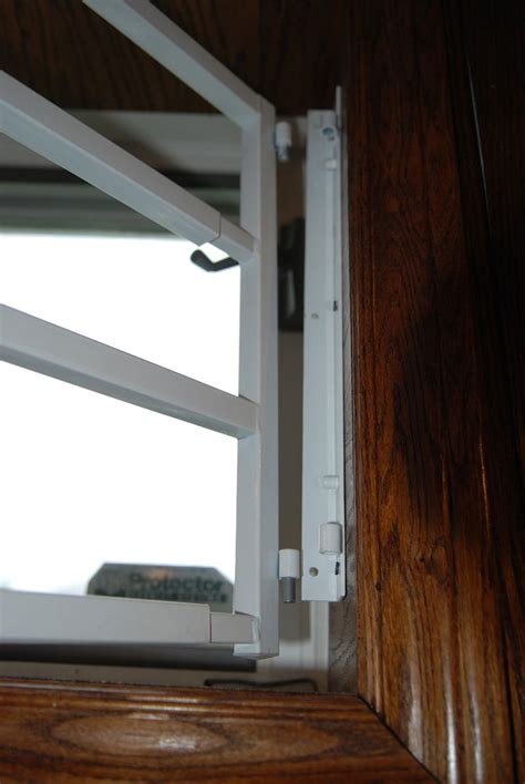 Security bars for residential windows especially for your basement in this case can be in form of egress that removable. Hinged Removable Bar - Hinged - basement window bar 2 ...