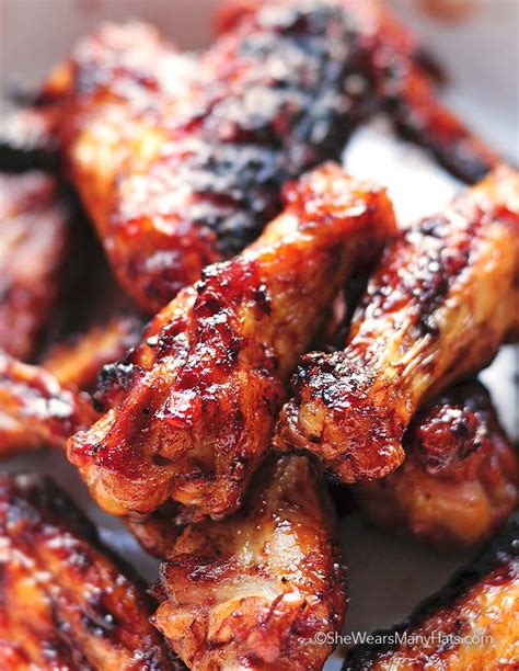 These wings are coated with a rub, cooked over indirect heat with the apple wood chunks for about 40 minutes, then finished with a sweet and spicy there's a lot going on here: Sweet and Spicy Grilled Chicken Wings