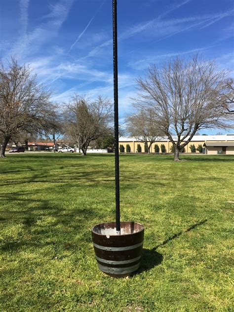 Using a post digger, dig a hole 1/3 of the length of your post. 1/2 Wine Barrel Concrete Weight (With Light Pole) Rental ...