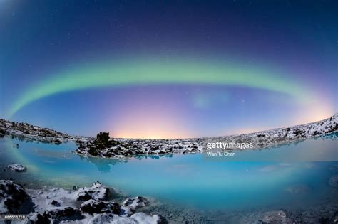 A Beautiful Aurora Dancing Over The Blue Lagoon Iceland High Res Stock