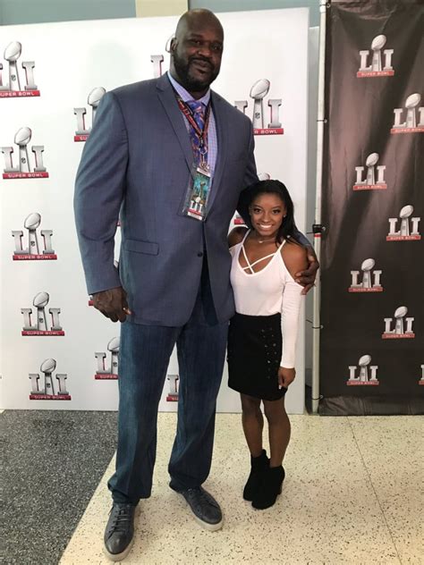 Simone biles is one of the most decorated female gymnasts of all time.she recently went viral after simone biles is an american gymnastcredit: Simone Biles & Shaq Take a Pic; Height Difference is ...