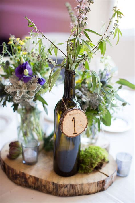 Adding height—instead of width—is a smart way to make arrangements feel more substantial. Gorgeous Rustic Wood Table Number with Twine for Mason ...