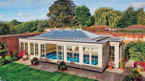 What do tony stark and bruce wayne have in common? Timber & Glass Pool House | Westbury Garden Rooms