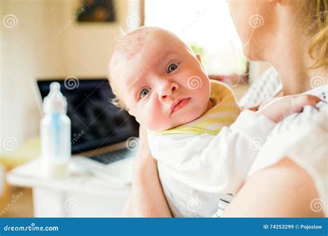 Unrecognizable Mother Caressing Crying Newborn Baby Son Stock Photo