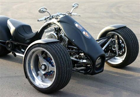 A custom front end replaces the traditional design in order to give this motorcycle all wheel drive. Reverse Trike Club & Street Driven Quads