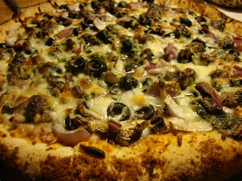 Former Food Junkie Pesto Olive Onion And Mushroom Pizza