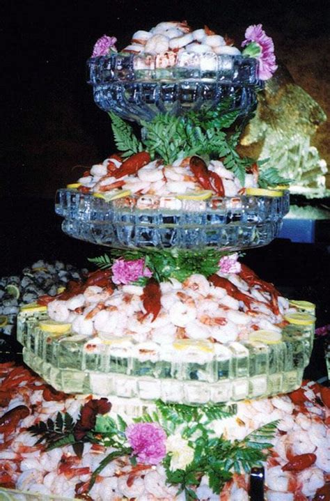 An elegant ice bar for a very nice wedding at oneida cc. IceSculptures\three_tiered_shrimp_fountain.jpg 500×759 ...