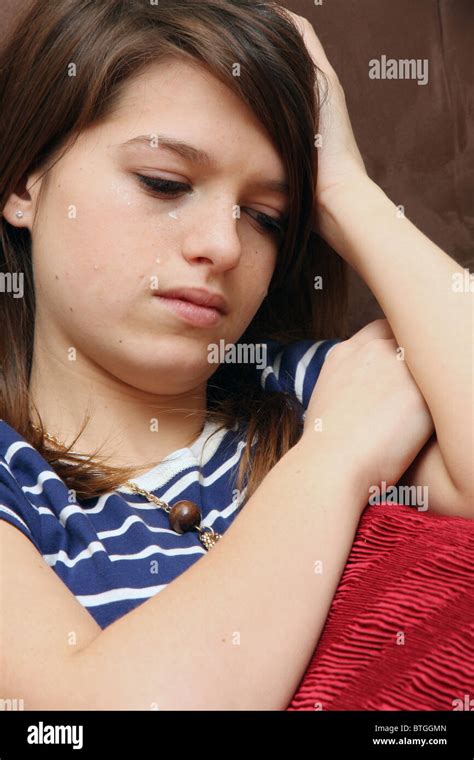 A Depressed Teenage Girl Crying Stock Photo Alamy