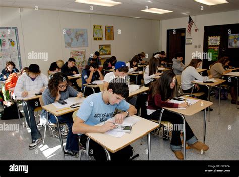 Students In High School Classroom Taking A Standardized Math Test Stock