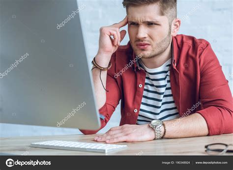 Confused Man Looking Computer Screen ⬇ Stock Photo, Image by ...