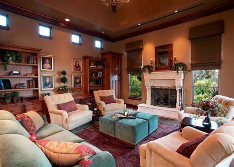Warm Traditional Living Room With Neutral Tufted Arm Chairs Turquoise