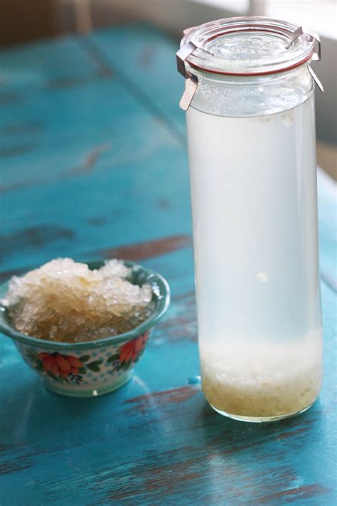 After drinking the water, the man would cut the coconut in half and used the top as a spoon to scoop out the meat. 7 Reasons I Drink Coconut Water Kefir - Cultured Food Life
