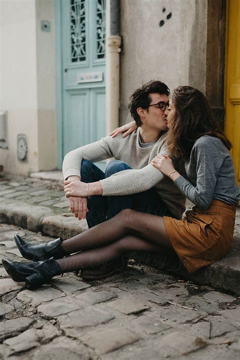 Cute Couple Kissing On Paris Sidewalk By Phil Chester Photography